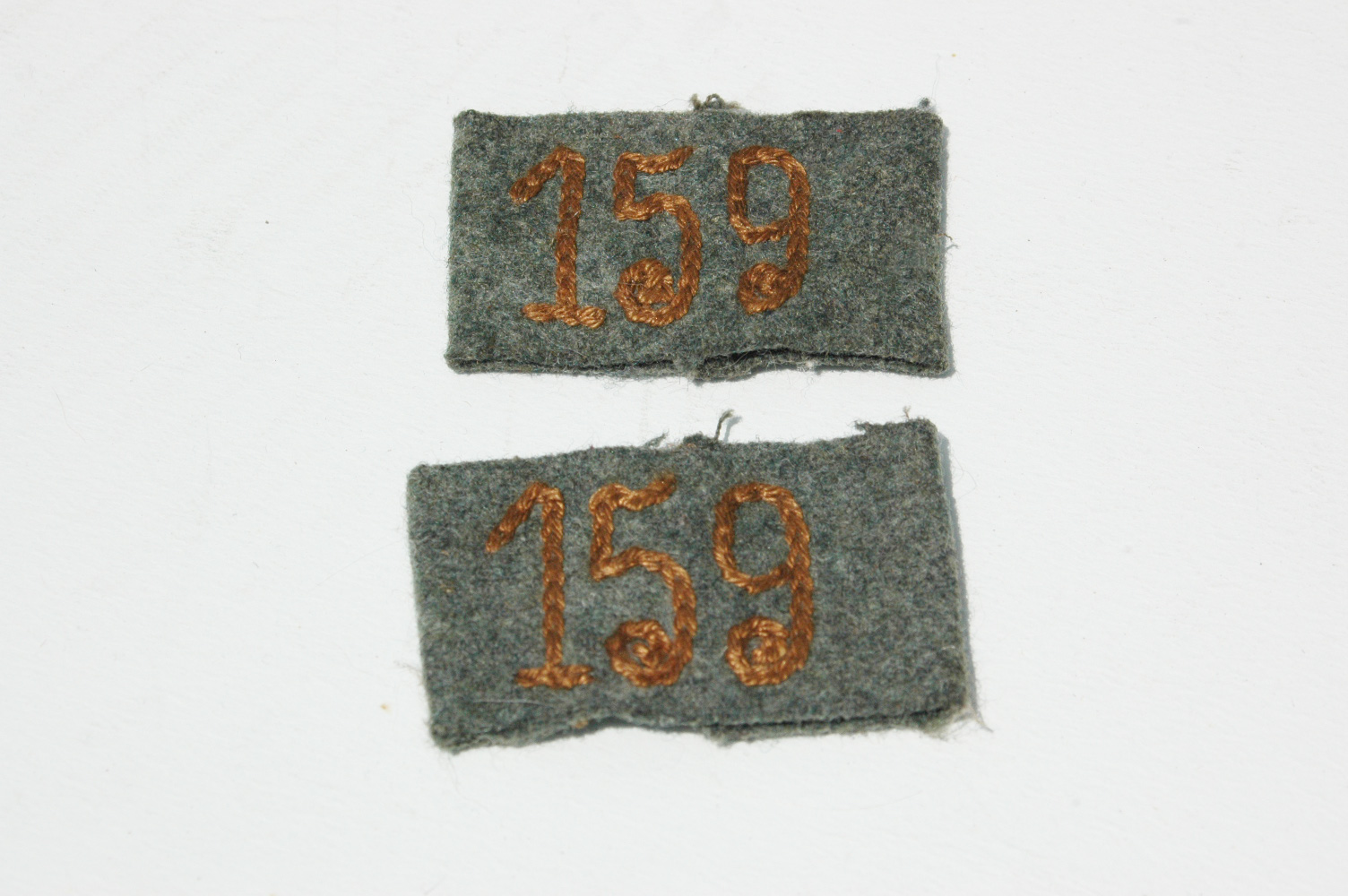 German WWII Shouldrboard Slip On Regt. Numbers