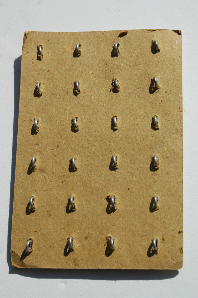German WWII Silver Pebbled buttons on the Card